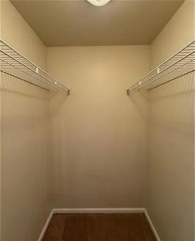 a view of a room with racks on the wall