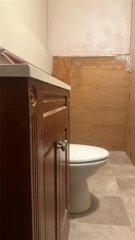 a bathroom with a toilet