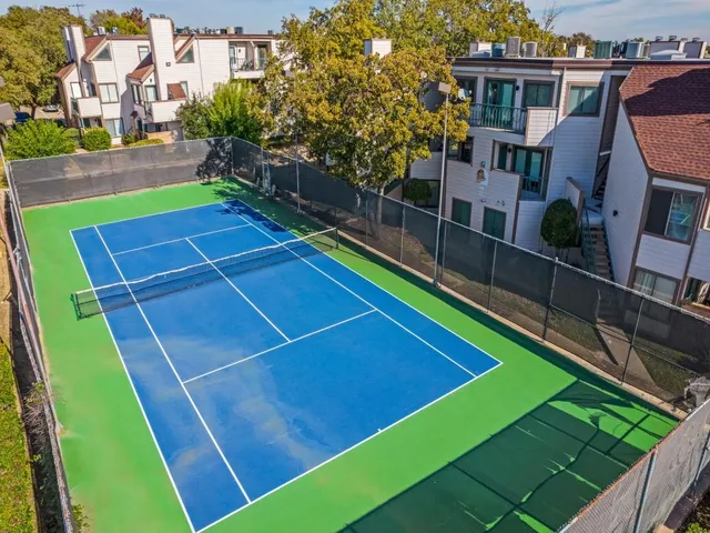 a view of a tennis court with a tennis court