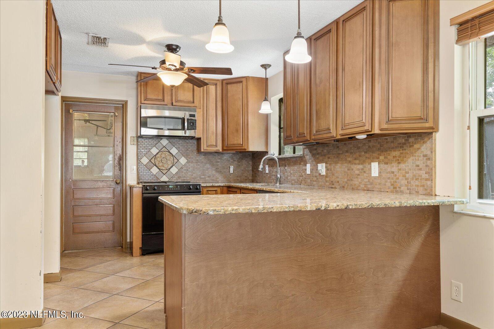 11150 Bridges Road Jacksonville, FL 32218 - Photo 7 of 31 11-063A0079