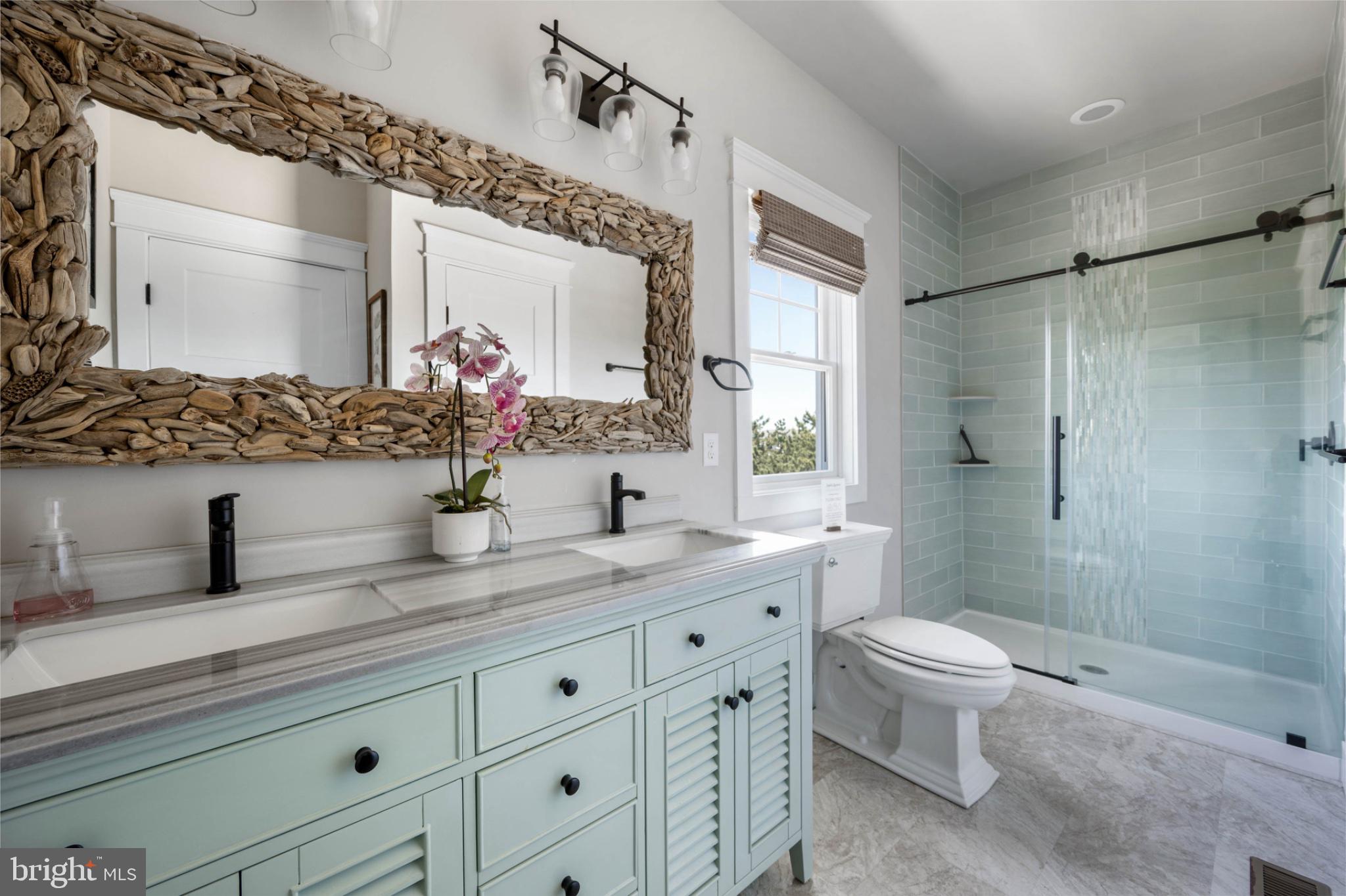 402 Bay Front Road Milton, DE 19968 - Photo 44 of 50 Serene bathroom with coastal charm.