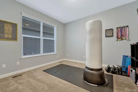 a room with a bed and a window