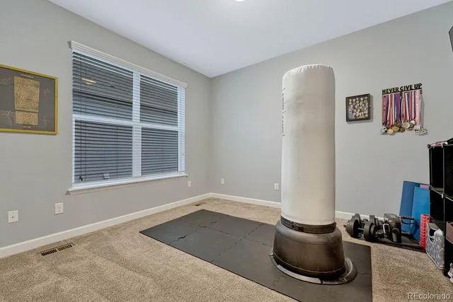 a room with a bed and a window