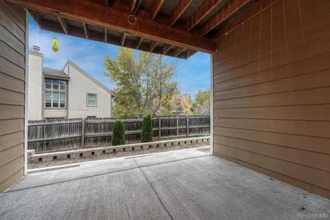 a view of a glass door with a room