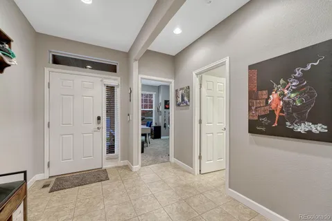 wooden floor with white walls