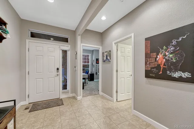 wooden floor with white walls
