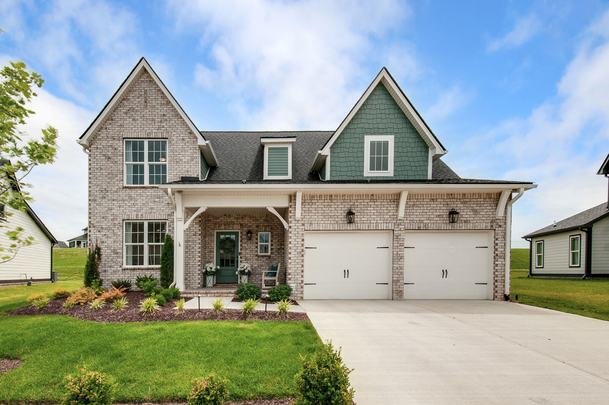 64 Haystack Way Mount Juliet, TN 37122 - Photo 1 of 41 a front view of a house with a yard and garage