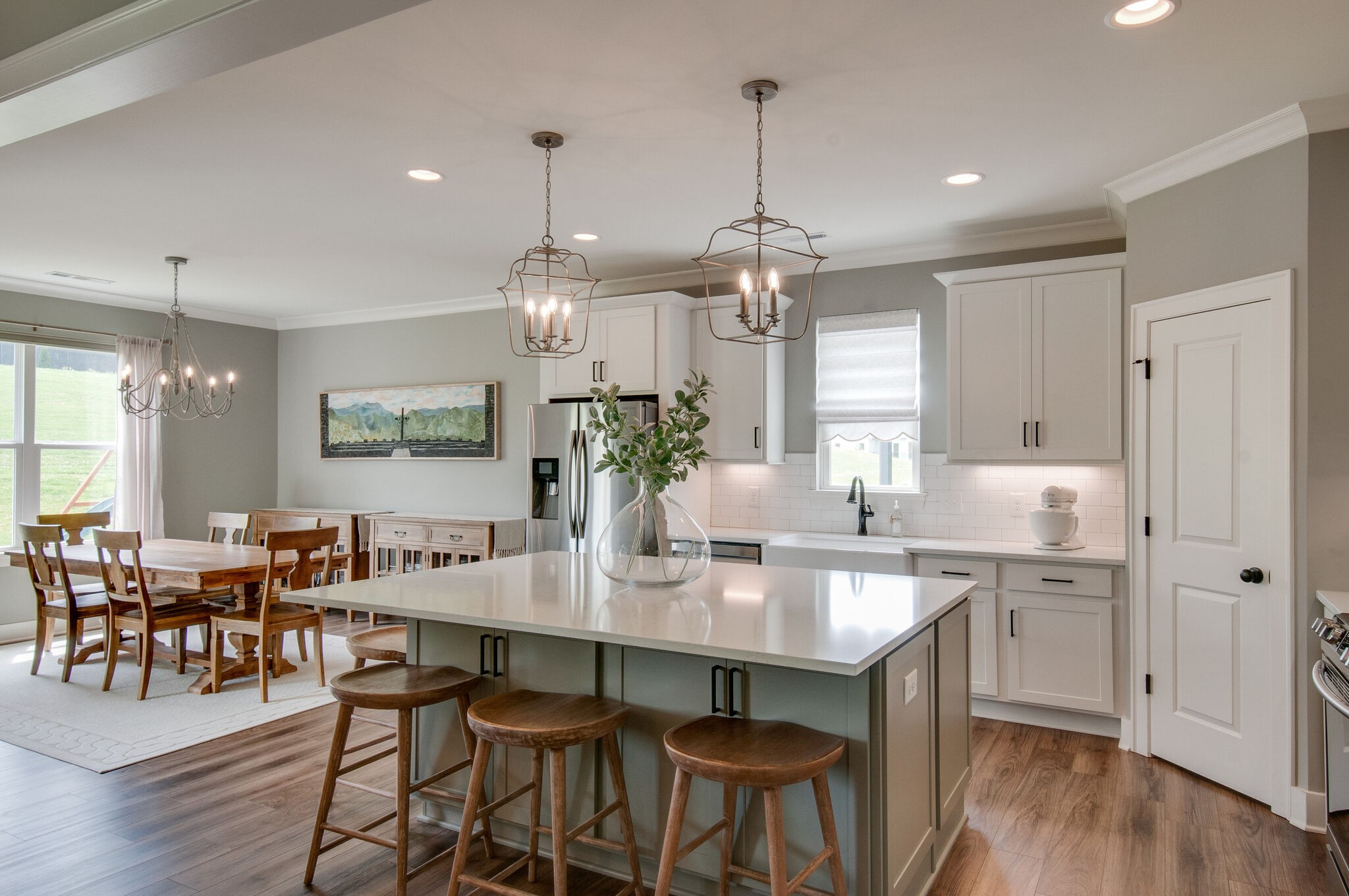 64 Haystack Way Mount Juliet, TN 37122 - Photo 11 of 41 a dining room filled chandelier and wooden floor