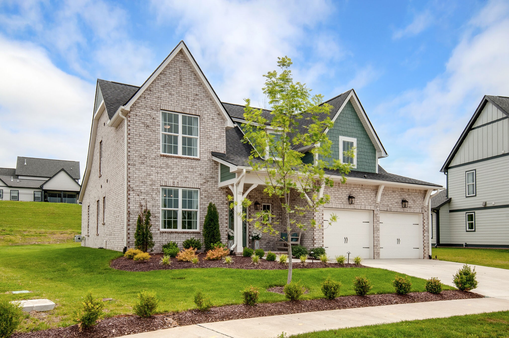 64 Haystack Way Mount Juliet, TN 37122 - Photo 3 of 41 a front view of a house with garden
