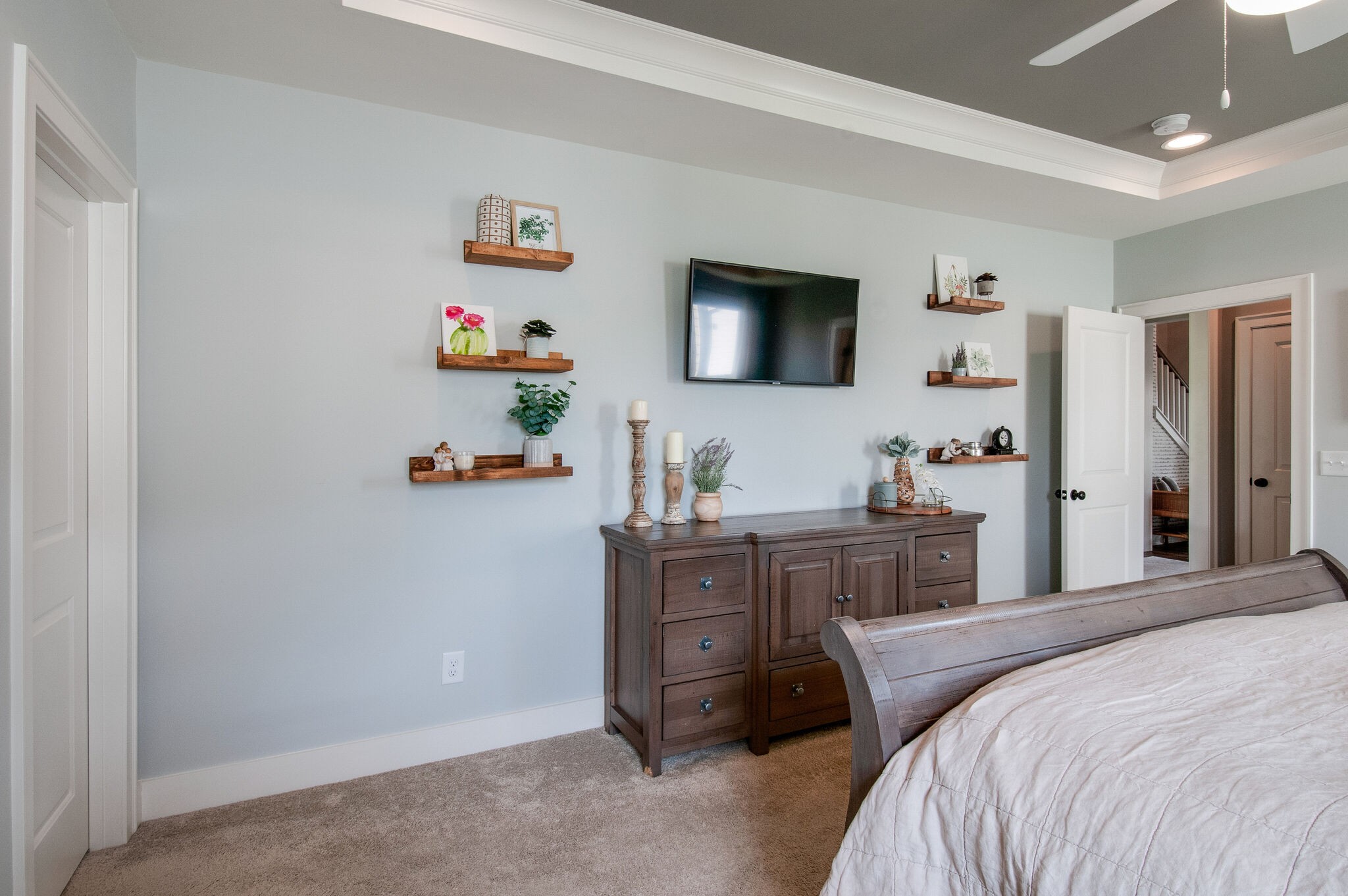 64 Haystack Way Mount Juliet, TN 37122 - Photo 23 of 41 a bedroom with a bed and a flat screen tv