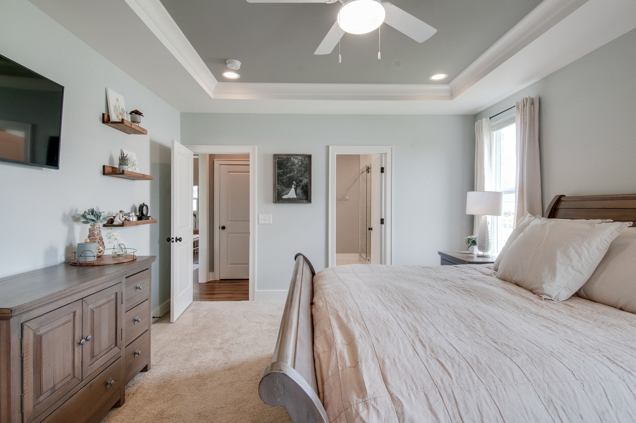64 Haystack Way Mount Juliet, TN 37122 - Photo 24 of 41 a bedroom with a bed and flat screen tv