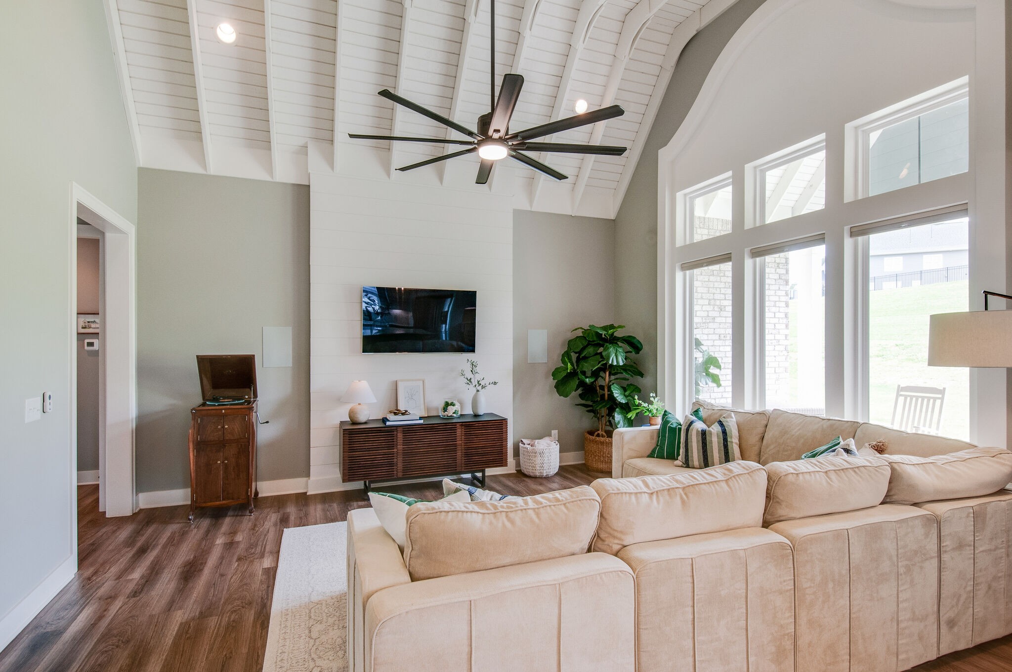 64 Haystack Way Mount Juliet, TN 37122 - Photo 10 of 41 a living room with furniture a flat screen tv and a large window