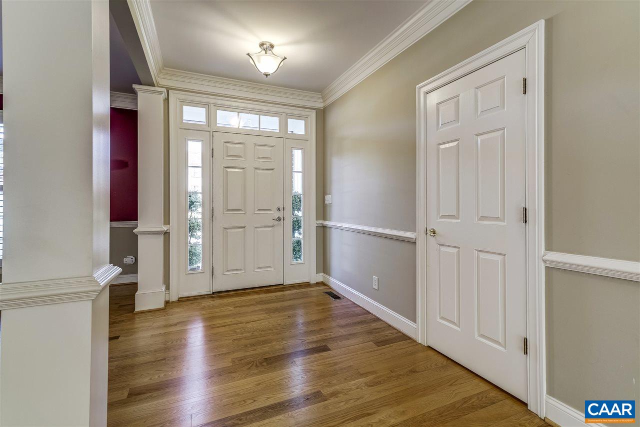 3398 Darby Road Keswick, VA 22947 - Photo 2 of 50 an empty room with wooden floor closet and windows