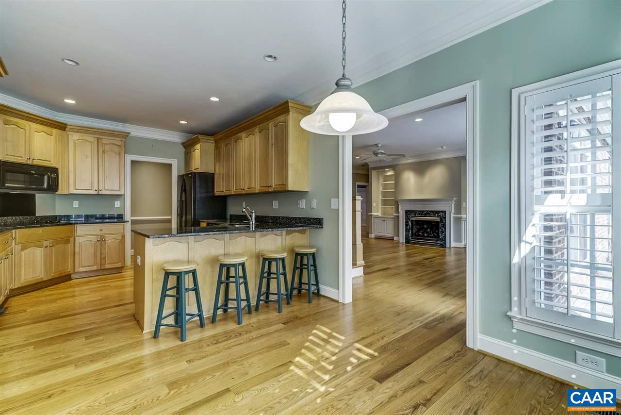 3398 Darby Road Keswick, VA 22947 - Photo 21 of 50 a view of a kitchen with kitchen island granite countertop a window and a view of living room