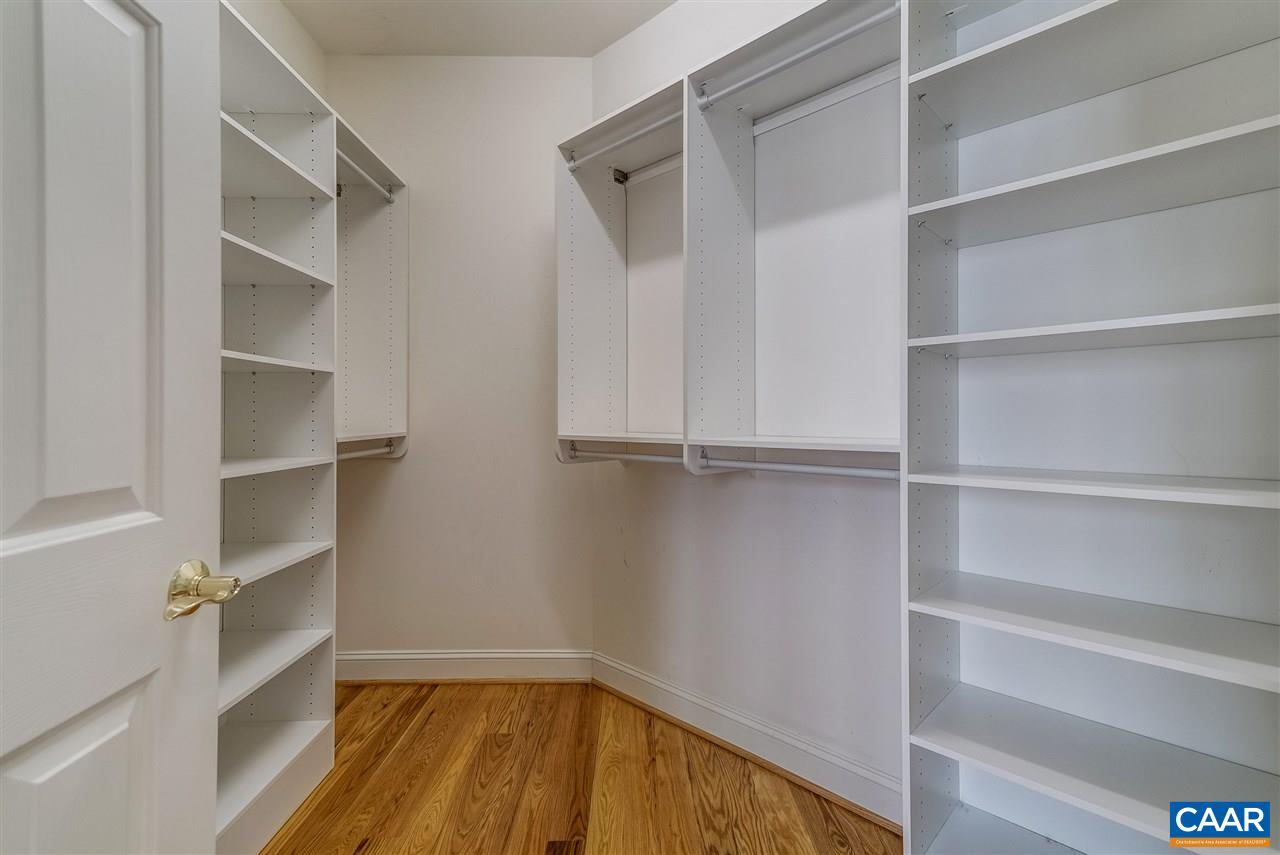 3398 Darby Road Keswick, VA 22947 - Photo 28 of 50 a view of walk in closet with empty racks