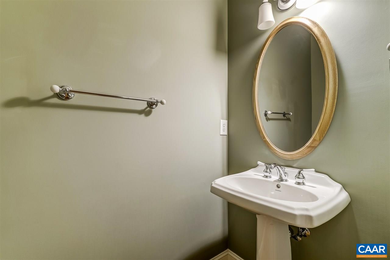 3398 Darby Road Keswick, VA 22947 - Photo 32 of 50 a bathroom with a sink and a mirror