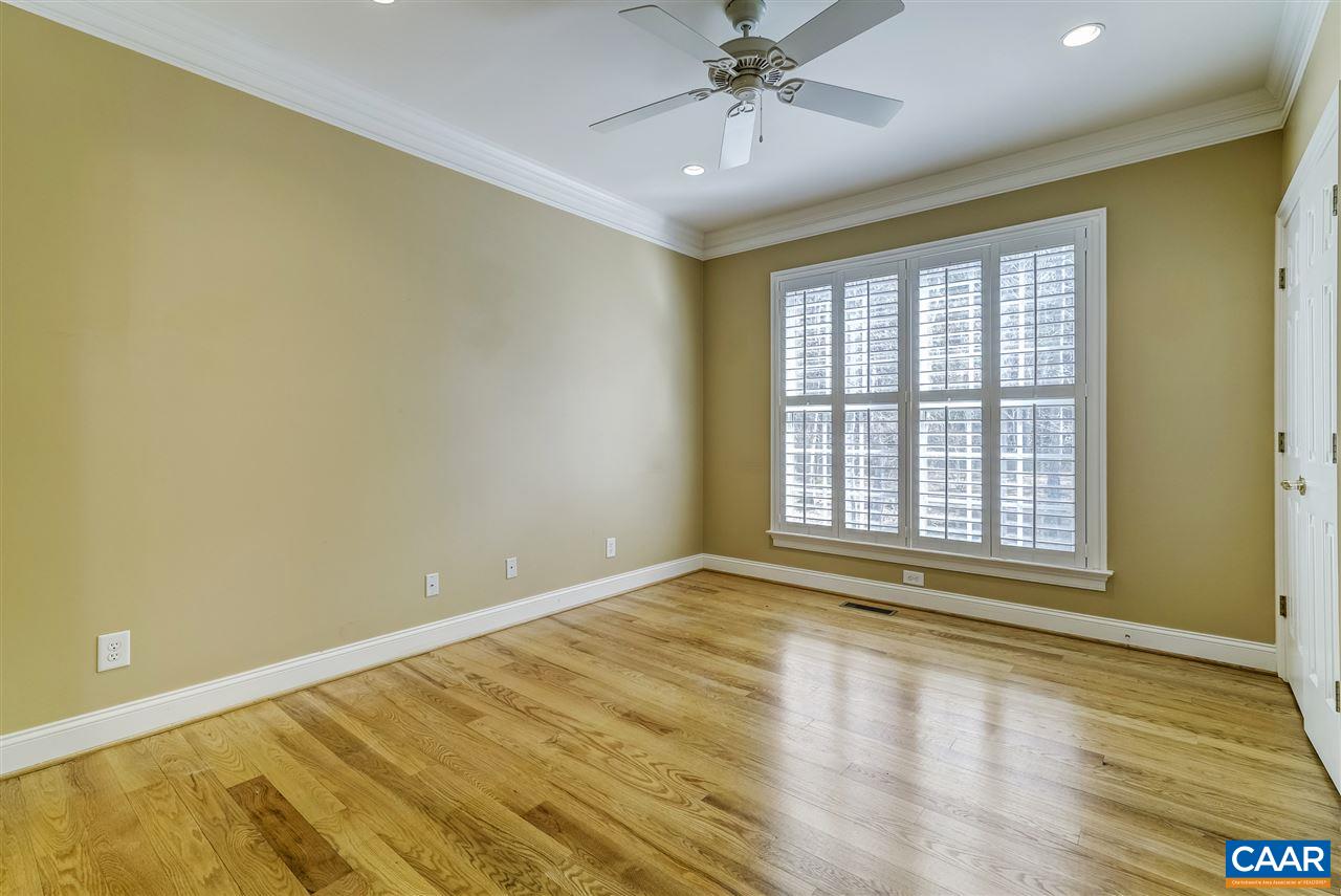 3398 Darby Road Keswick, VA 22947 - Photo 36 of 50 a view of an empty room with a window and wooden floor