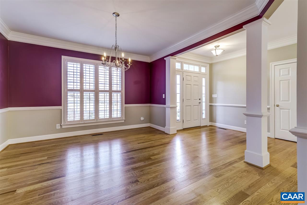 3398 Darby Road Keswick, VA 22947 - Photo 6 of 50 a view of an empty room with wooden floor and a window