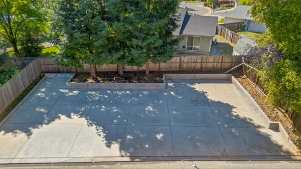 a view of a yard with an outdoor space