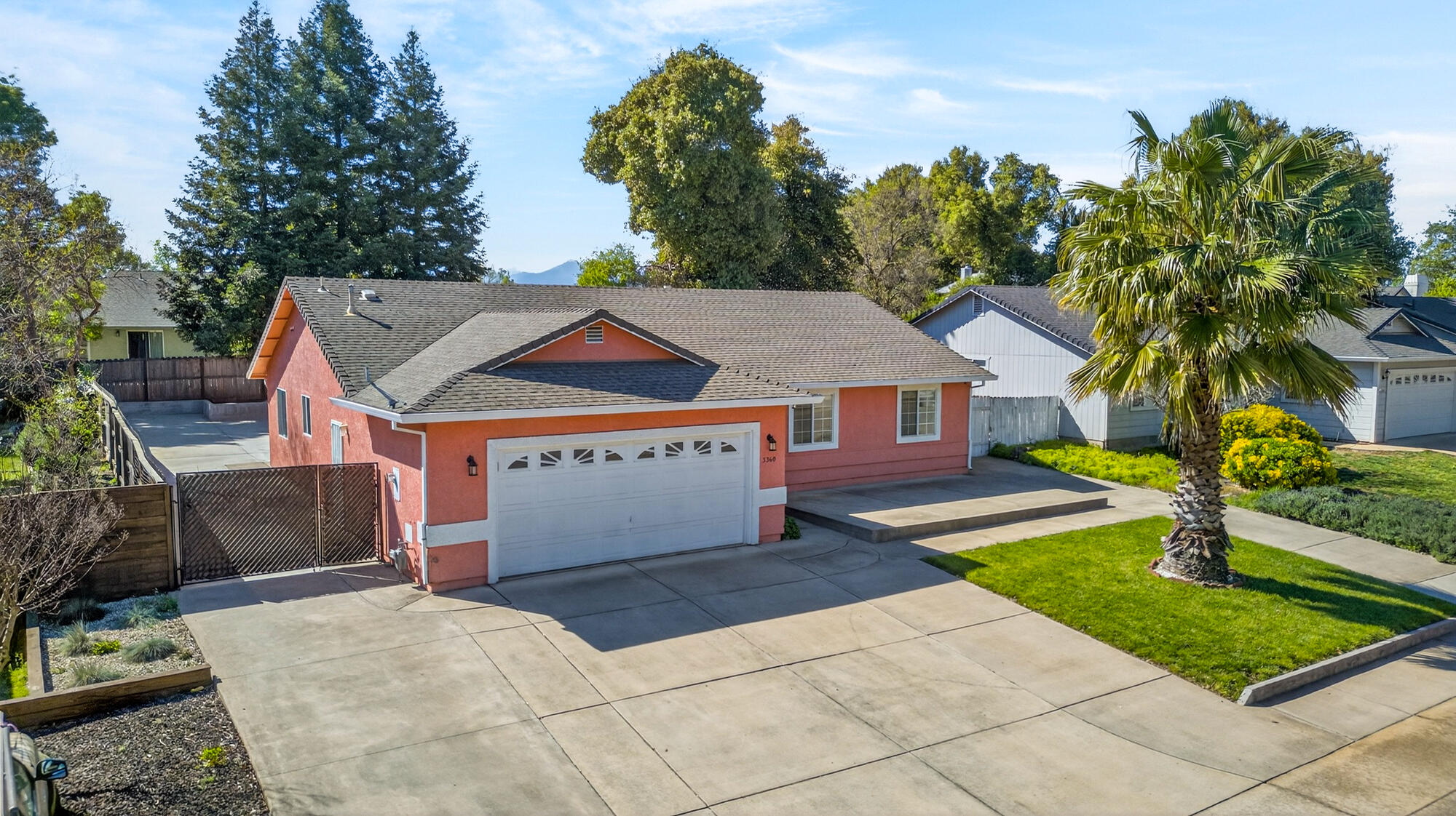 3360 Lawrence Road Redding, CA 96002 - Photo 39 of 43 a front view of a house with garden