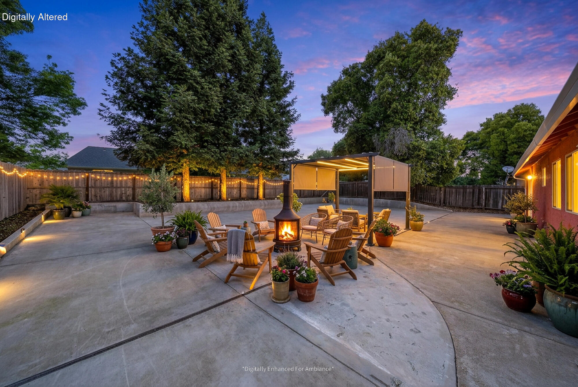 3360 Lawrence Road Redding, CA 96002 - Photo 6 of 43 a view of a patio with table and chairs potted plants and a palm tree