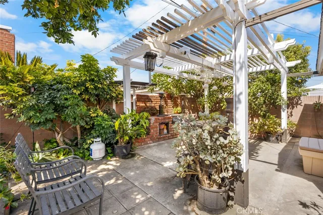 a view of a chairs and table in a patio