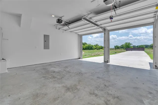 a view of a room with a large window