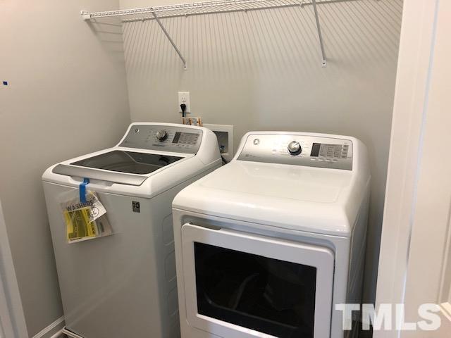 307 Devon Clfs Drive Wake Forest, NC 27587 - Photo 12 of 13 a utility room with dryer and washer
