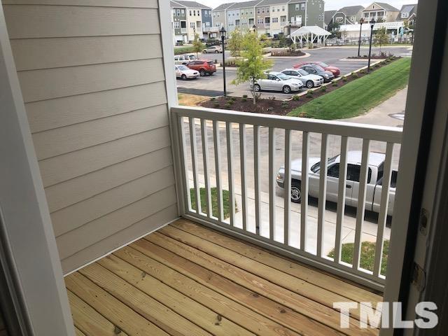 307 Devon Clfs Drive Wake Forest, NC 27587 - Photo 13 of 13 a view of a balcony with wooden floor