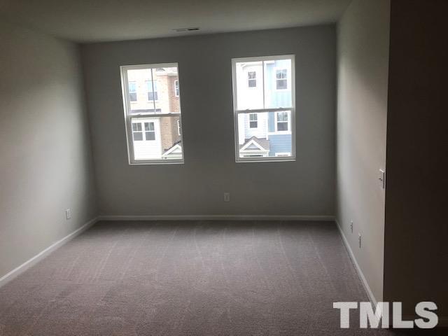 307 Devon Clfs Drive Wake Forest, NC 27587 - Photo 7 of 13 an empty room with a window