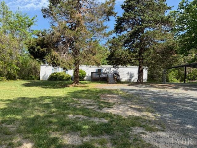 1098 Pamplin Road Pamplin, VA 23958 - Photo 26 of 26 a backyard of a house with table and chairs