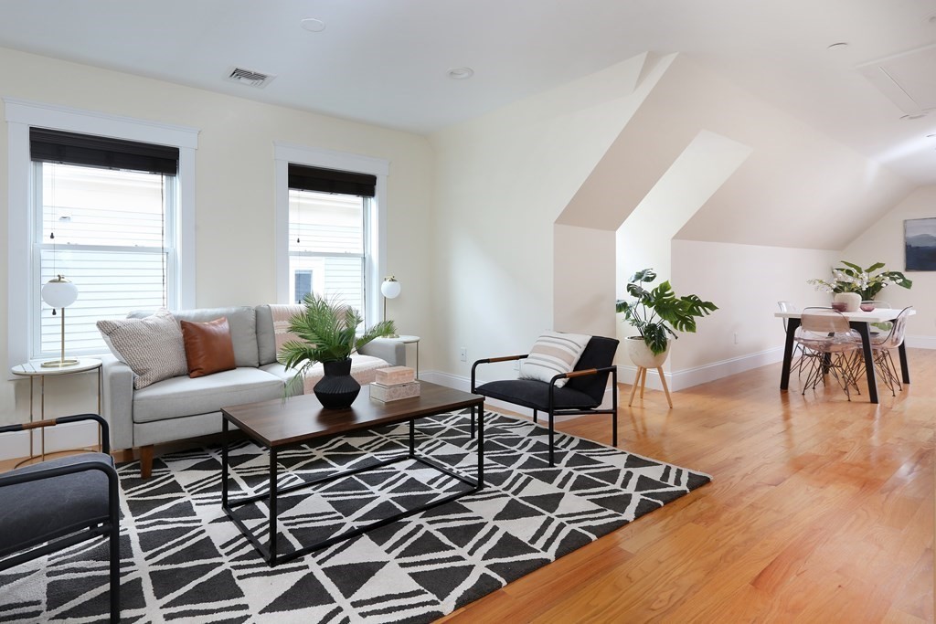 150 Lowell Street, Unit 3 Somerville, MA 02143 - Photo 6 of 12 a living room with furniture