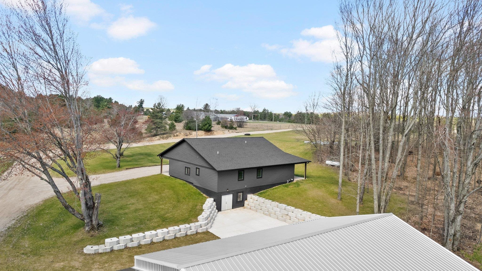 12095 Mueller Road Southwest Fife Lake, MI 49633 - Photo 1 of 51 1921447-b3efd257-58e4-4afe-806e-ab51a41ecdb9.JPG