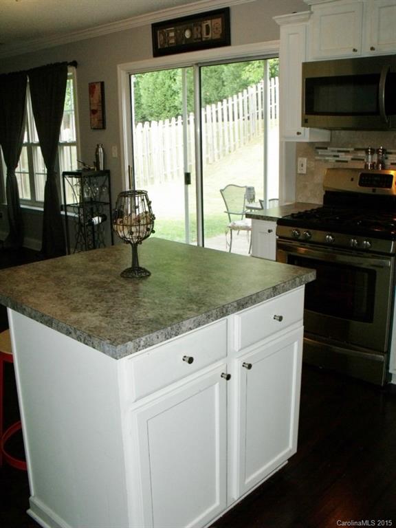 15210 Tracy Beth Road Huntersville, NC 28078 - Photo 11 of 24 a kitchen with sink a window and appliances
