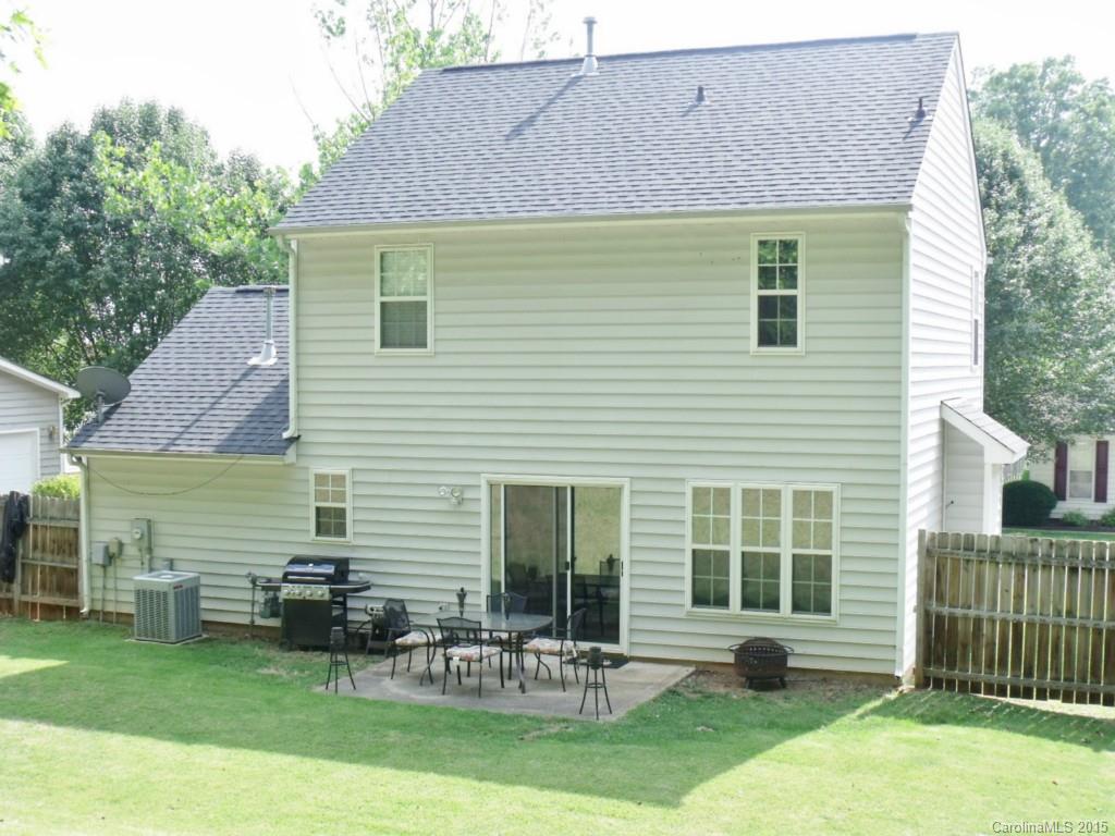 15210 Tracy Beth Road Huntersville, NC 28078 - Photo 24 of 24 a front view of house with a garden and patio