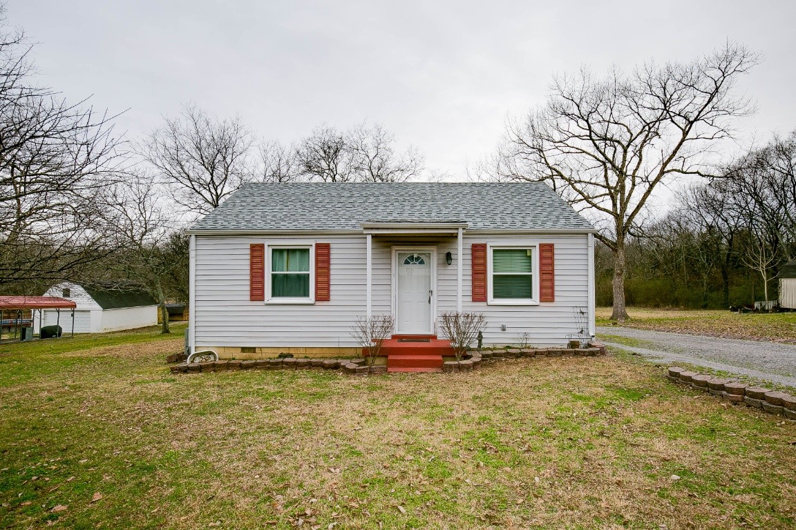 a house view with a garden space
