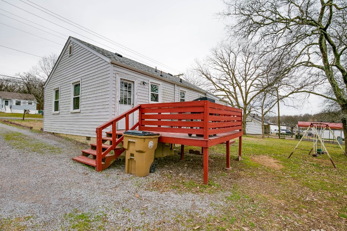304 Randy Road Madison, TN 37115 - Photo 34 of 34 a backyard of a house with barbeque oven table and chairs