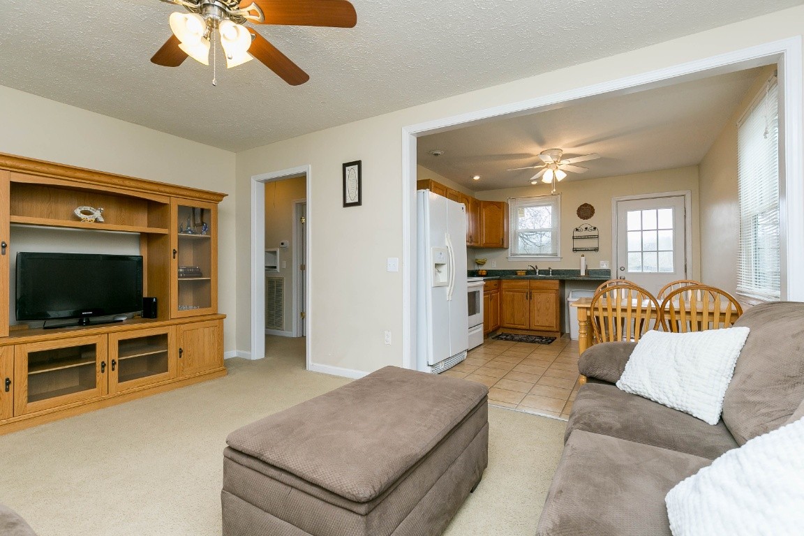 304 Randy Road Madison, TN 37115 - Photo 7 of 34 a living room with furniture and a flat screen tv