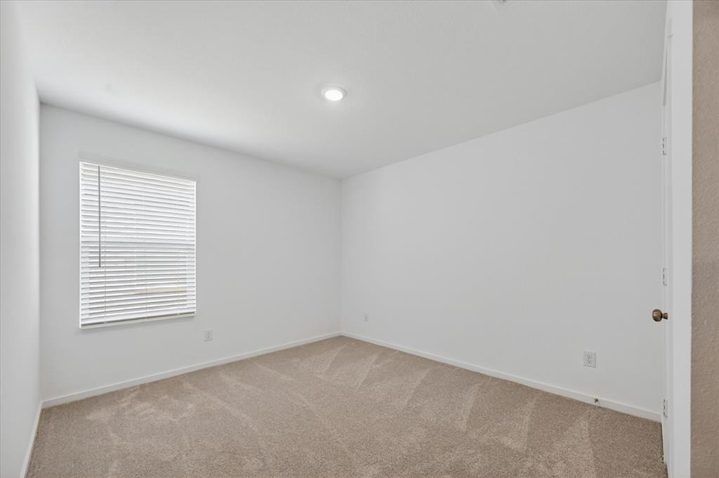 1516 Prince Road Howe, TX 75459 - Photo 15 of 28 an empty room with a window