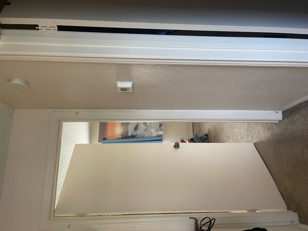 12308 A Los Indios Trail Austin, TX 78729 - Photo 12 of 19 a view of a bathroom with a glass door