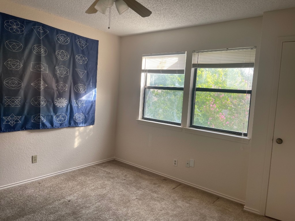 12308 A Los Indios Trail Austin, TX 78729 - Photo 13 of 19 a view of an empty room with a window