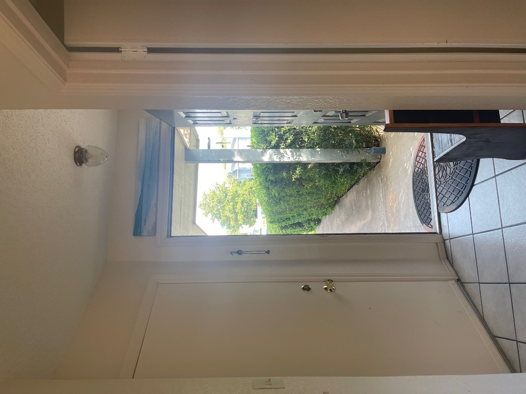 12308 A Los Indios Trail Austin, TX 78729 - Photo 7 of 19 a view of an entryway