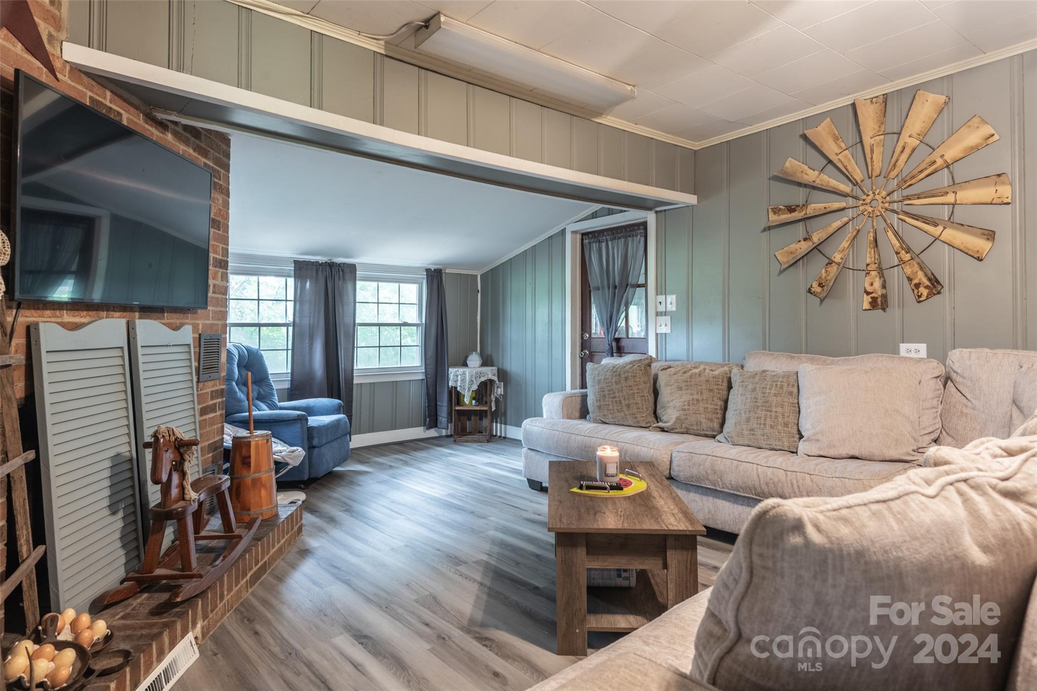 3913 Belk Mill Road Monroe, NC 28112 - Photo 11 of 25 a living room with furniture and wooden floor