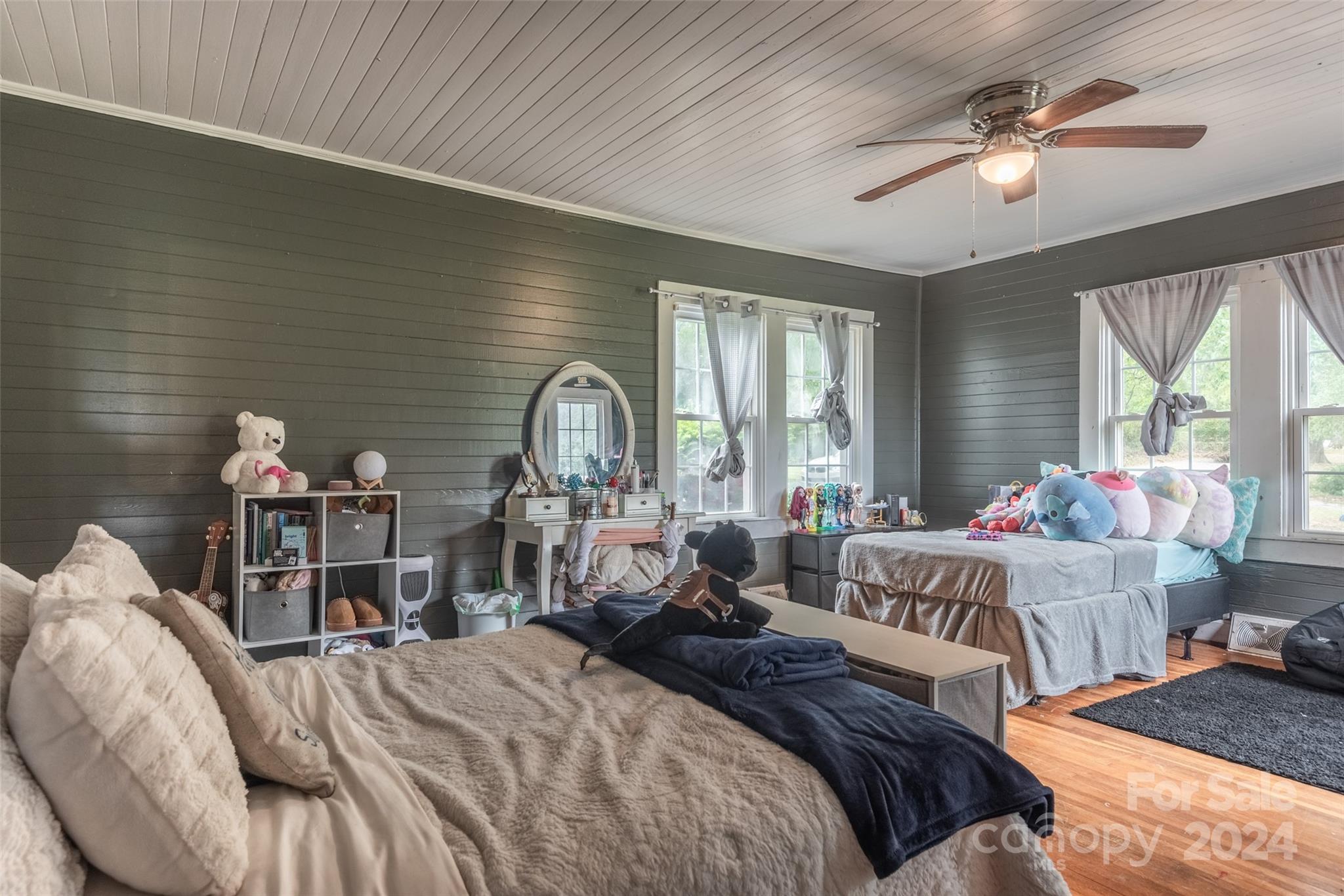 3913 Belk Mill Road Monroe, NC 28112 - Photo 15 of 25 a bedroom with bed and a large window