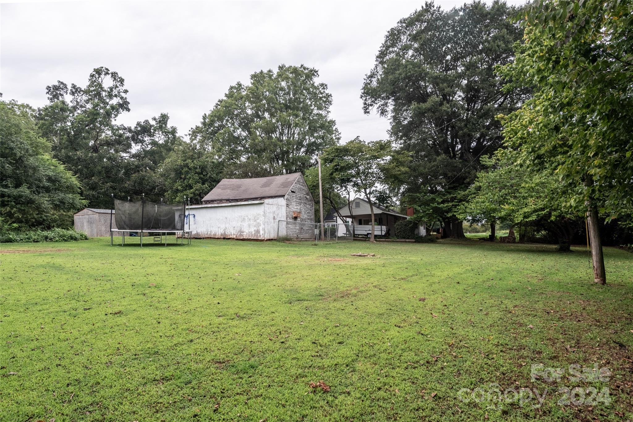 3913 Belk Mill Road Monroe, NC 28112 - Photo 23 of 25 a fire hydrant in the middle of a field