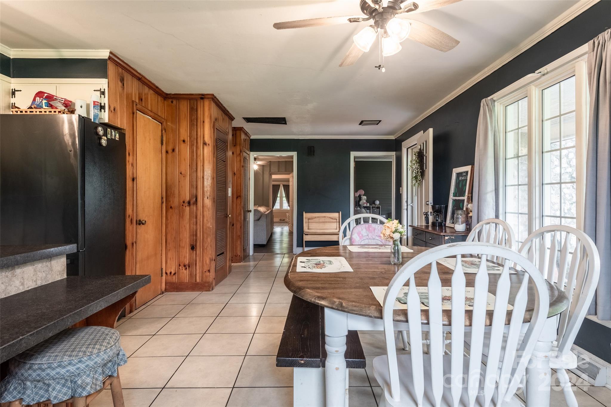 3913 Belk Mill Road Monroe, NC 28112 - Photo 5 of 25 a view of a dining room with furniture window and outside view
