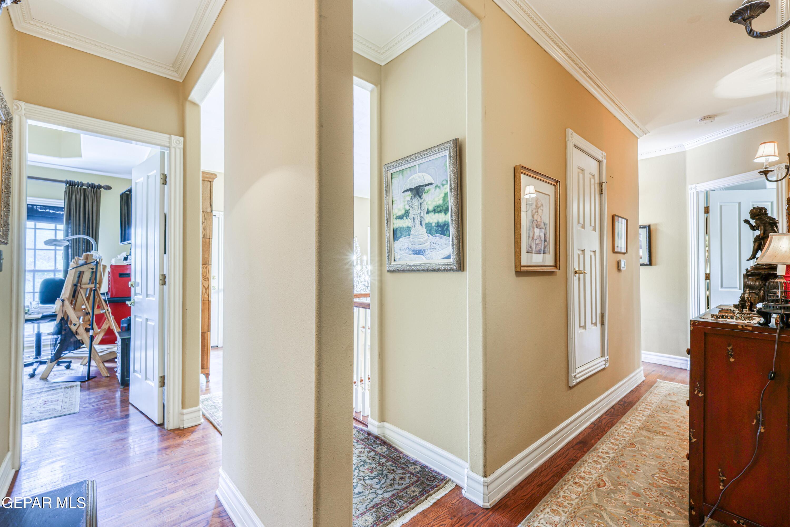 501 Country Club Road El Paso, TX 79932 - Photo 56 of 88 a view of a hallway with bathroom and wooden floor