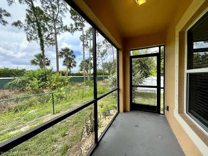 a view of balcony and trees