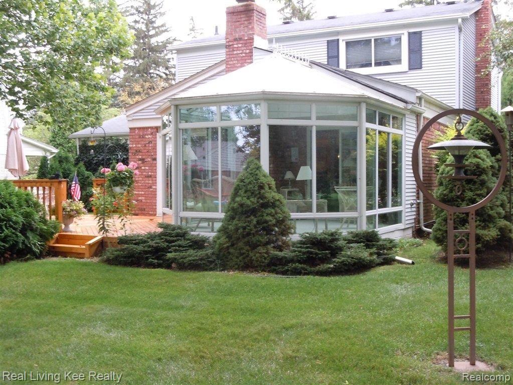 827 Hampton Circle Rochester, MI 48307 - Photo 20 of 21 Backyard view of Solarium.jpg