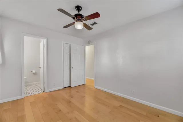 a view of a big room with wooden floor
